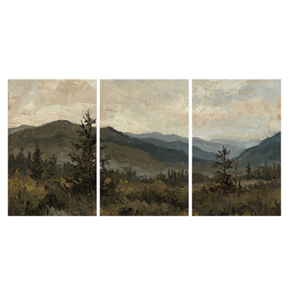Layered mountain ridges and dark evergreen trees beneath a muted cloudy sky set of 3 poster prints viewed straight on