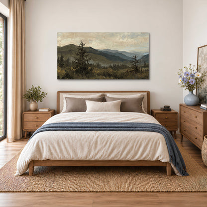 Layered mountain ridges and dark evergreen trees beneath a muted cloudy sky single canvas wall art styled in an interior