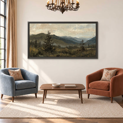 Layered mountain ridges and dark evergreen trees beneath a muted cloudy sky single framed canvas wall art styled in an interior