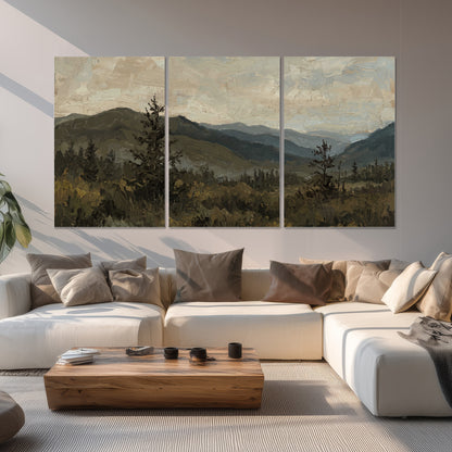Layered mountain ridges and dark evergreen trees beneath a muted cloudy sky set of 3 poster prints displayed in a living room