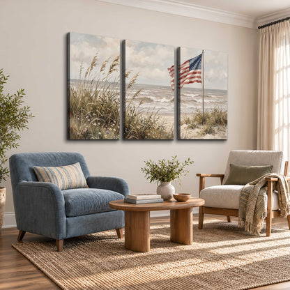An American flag above coastal grasses beside a quiet sandy beach 3 piece canvas wall art styled in an interior