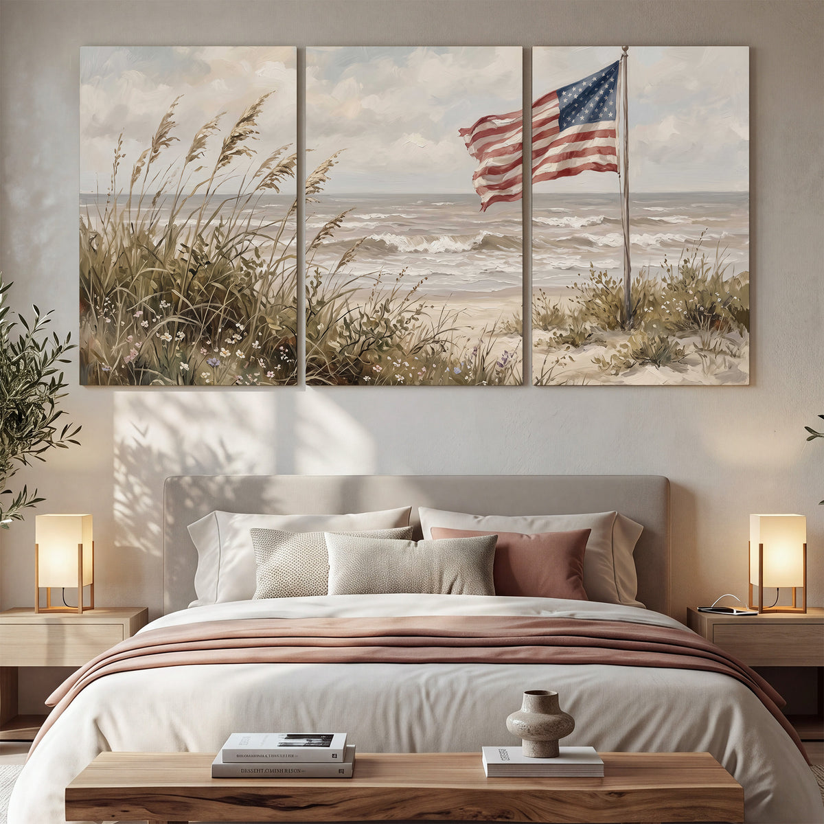An American flag above coastal grasses beside a quiet sandy beach 3 piece canvas wall art displayed in a bedroom