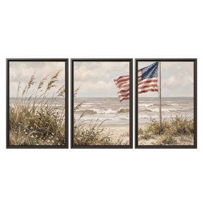 An American flag above coastal grasses beside a quiet sandy beach 3 piece framed canvas wall art viewed straight on