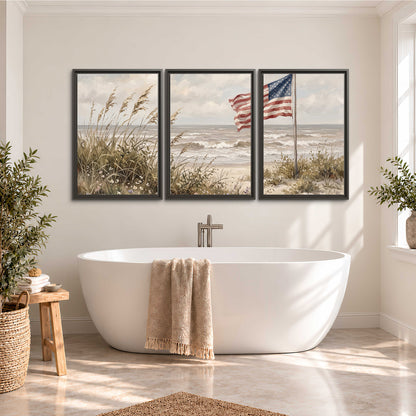An American flag above coastal grasses beside a quiet sandy beach 3 piece framed canvas wall art styled in an interior