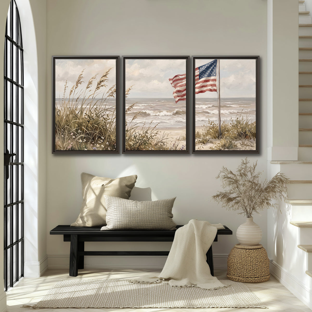 An American flag above coastal grasses beside a quiet sandy beach 3 piece framed canvas wall art displayed in a entryway