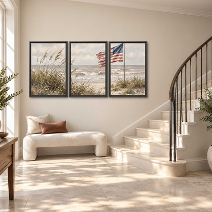 An American flag above coastal grasses beside a quiet sandy beach 3 piece framed canvas wall art styled in an interior
