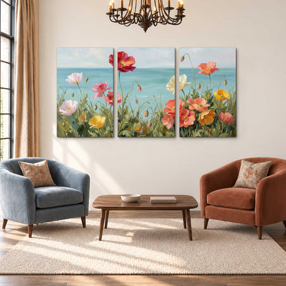 Colorful red, peach and yellow flowers beside a turquoise sea 3 piece canvas wall art styled in an interior