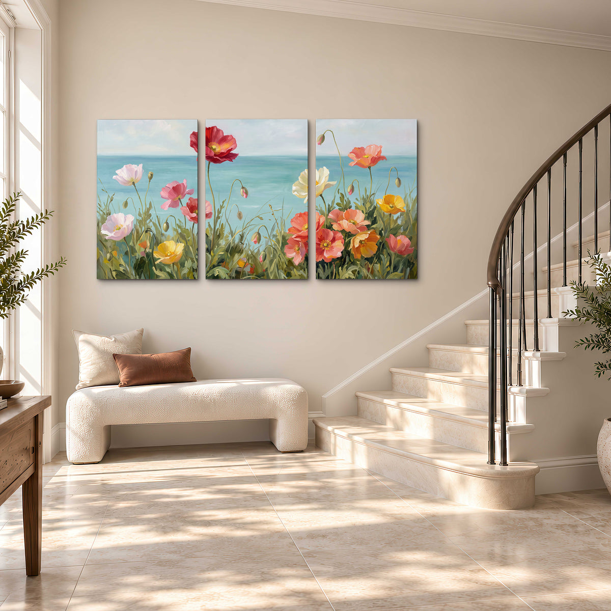 Colorful red, peach and yellow flowers beside a turquoise sea 3 piece canvas wall art styled in an interior