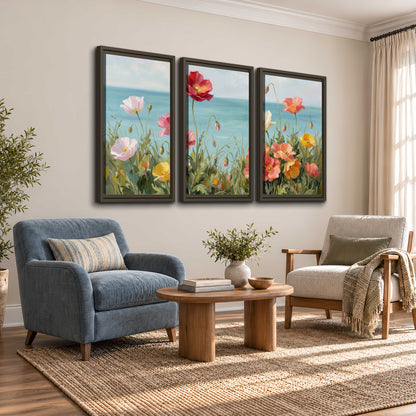 Colorful red, peach and yellow flowers beside a turquoise sea 3 piece framed canvas wall art styled in an interior