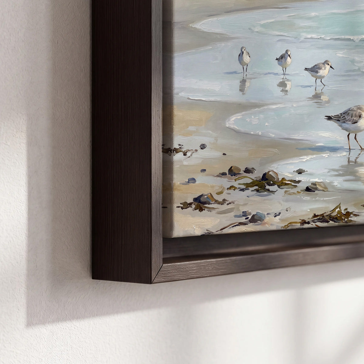 Small shorebirds standing along a pale blue shoreline 3 piece framed canvas wall art material and edge close up