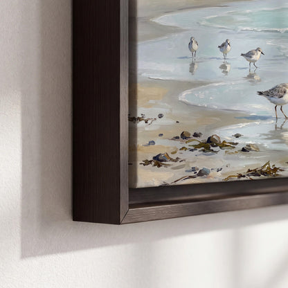 Small shorebirds standing along a pale blue shoreline 3 piece framed canvas wall art material and edge close up