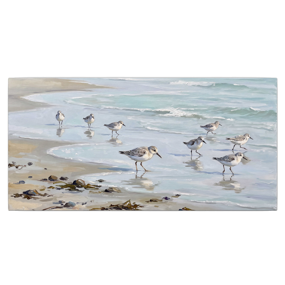 Small shorebirds standing along a pale blue shoreline single canvas wall art viewed straight on