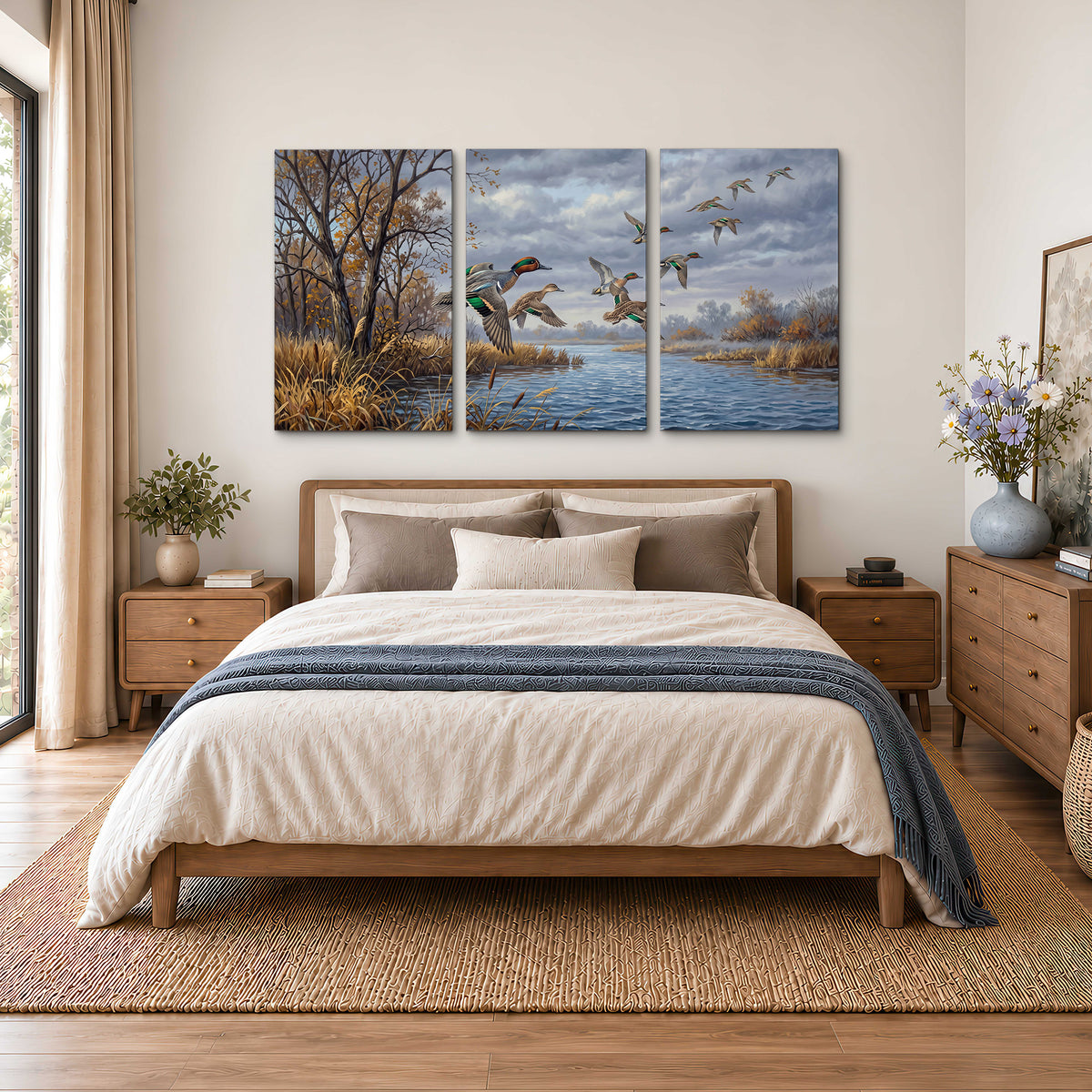 Ducks taking flight over a blue river framed by autumn branches 3 piece canvas wall art styled in an interior