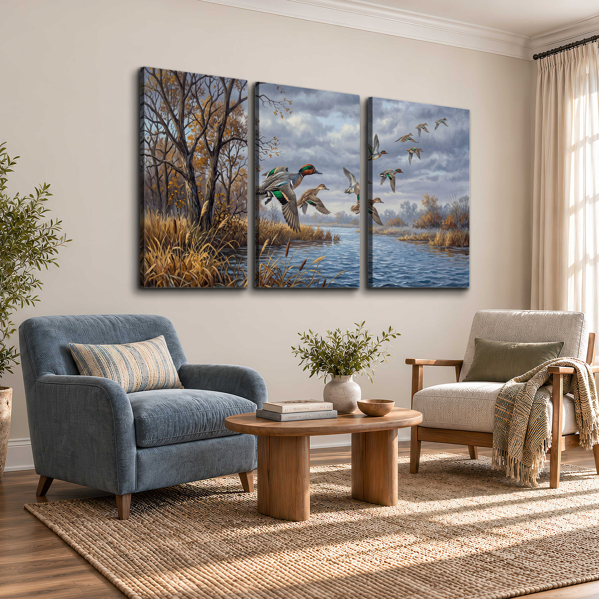 Ducks taking flight over a blue river framed by autumn branches 3 piece canvas wall art styled in an interior