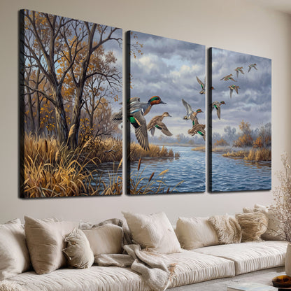 Ducks taking flight over a blue river framed by autumn branches 3 piece canvas wall art room and product view