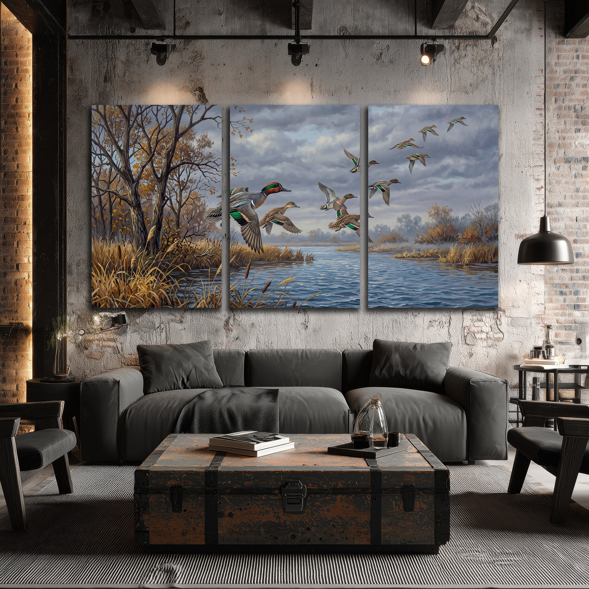 Ducks taking flight over a blue river framed by autumn branches 3 piece canvas wall art displayed in a industrial room