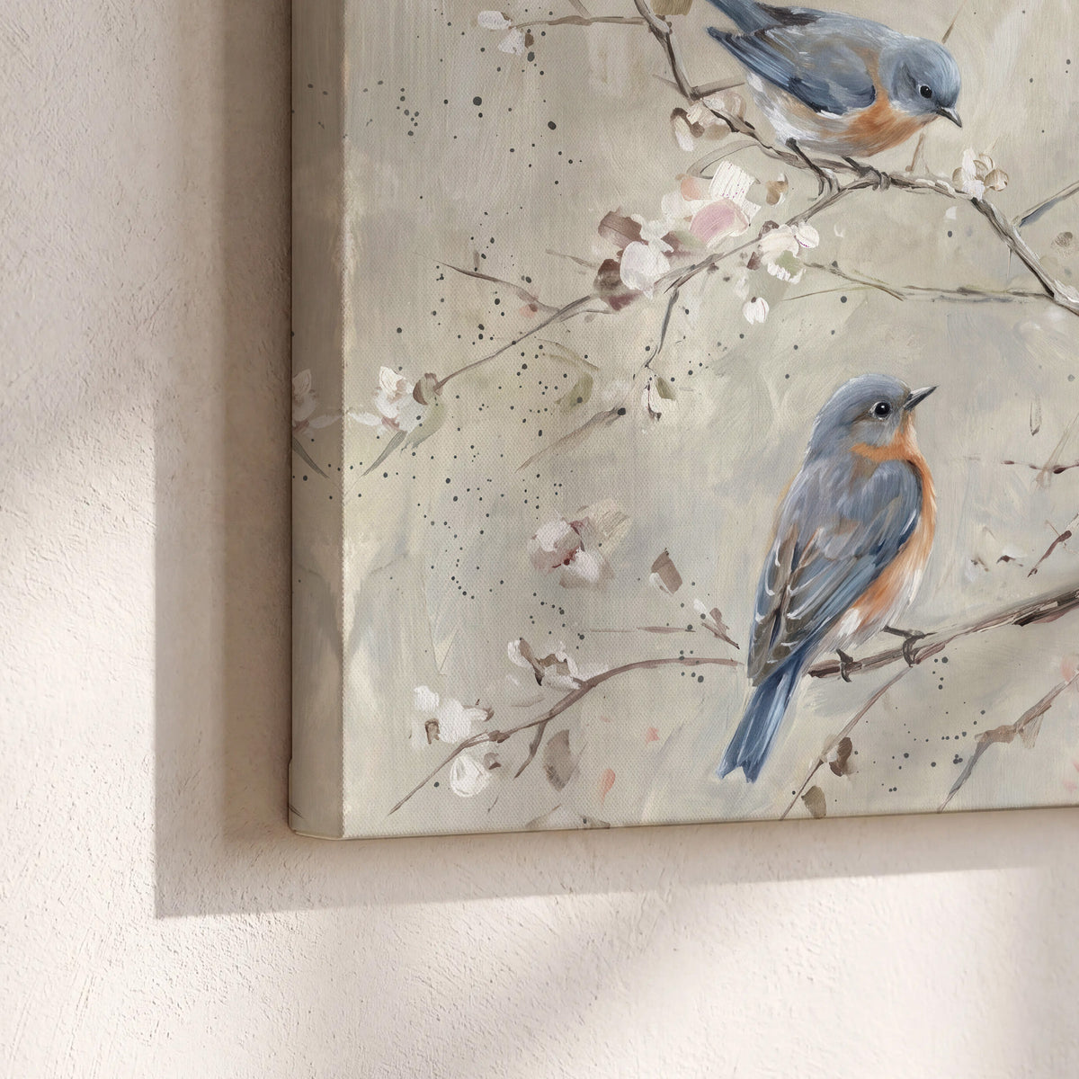 Bluebirds perched on delicate white flowering branches against pale sage 3 piece canvas wall art material and edge close up