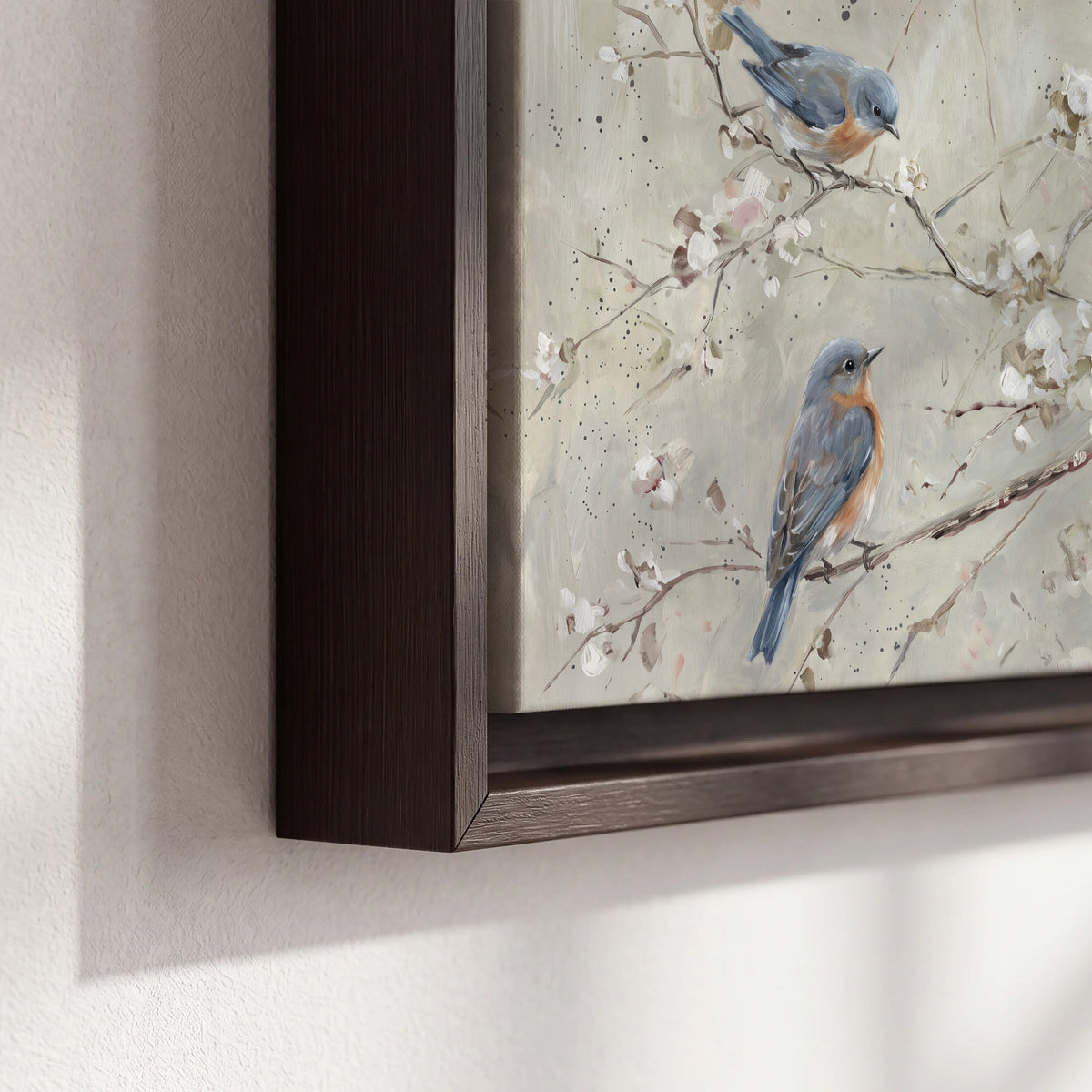 Bluebirds perched on delicate white flowering branches against pale sage 3 piece framed canvas wall art material and edge close up