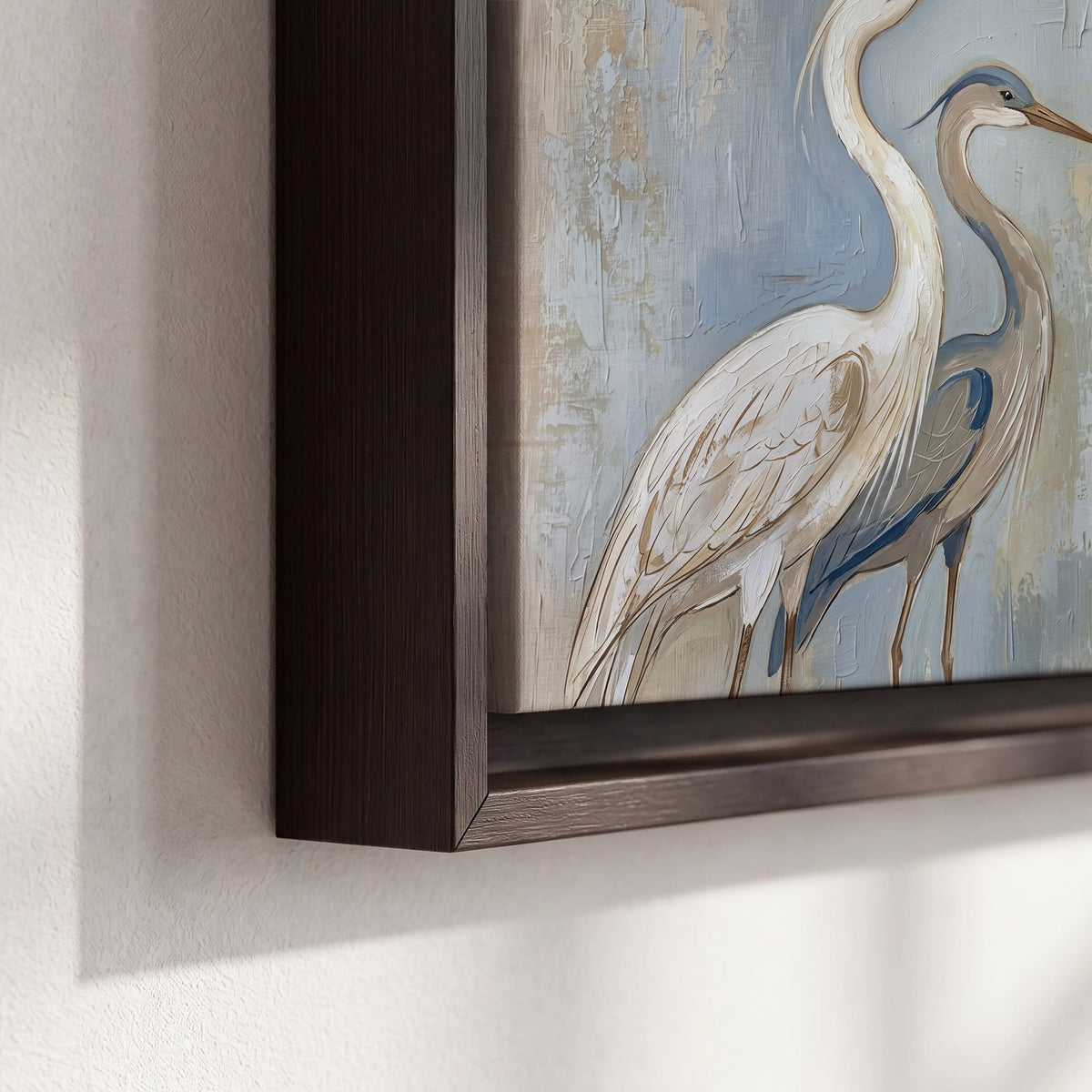 Three long-necked herons in soft ivory and dark blue against pale blue-gray 3 piece framed canvas wall art material and edge close up