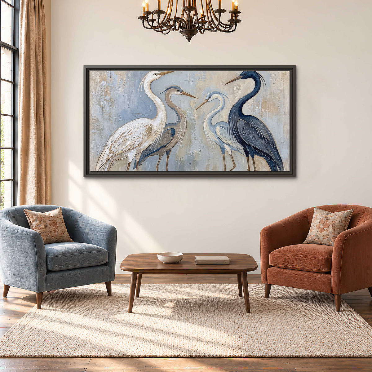 Three long-necked herons in soft ivory and dark blue against pale blue-gray single framed canvas wall art styled in an interior