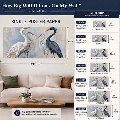 Three long-necked herons in soft ivory and dark blue against pale blue-gray single poster print size guide above a sofa; room view is illustrative