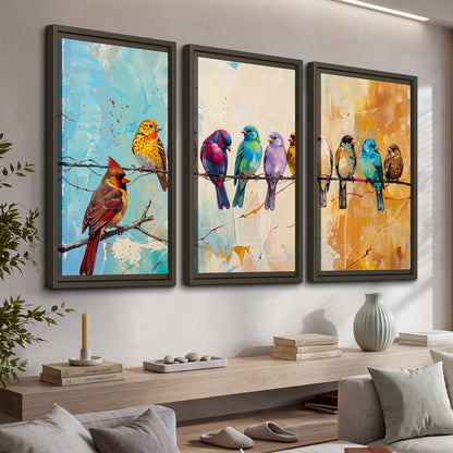 A row of brightly colored birds against expressive turquoise and ochre 3 piece framed canvas wall art displayed in a console
