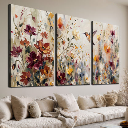 A small hummingbird among delicate pink, rust and ivory flowers 3 piece canvas wall art room and product view