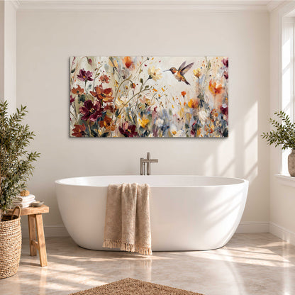 A small hummingbird among delicate pink, rust and ivory flowers single canvas wall art styled in an interior