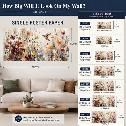 A small hummingbird among delicate pink, rust and ivory flowers single poster print size guide above a sofa; room view is illustrative