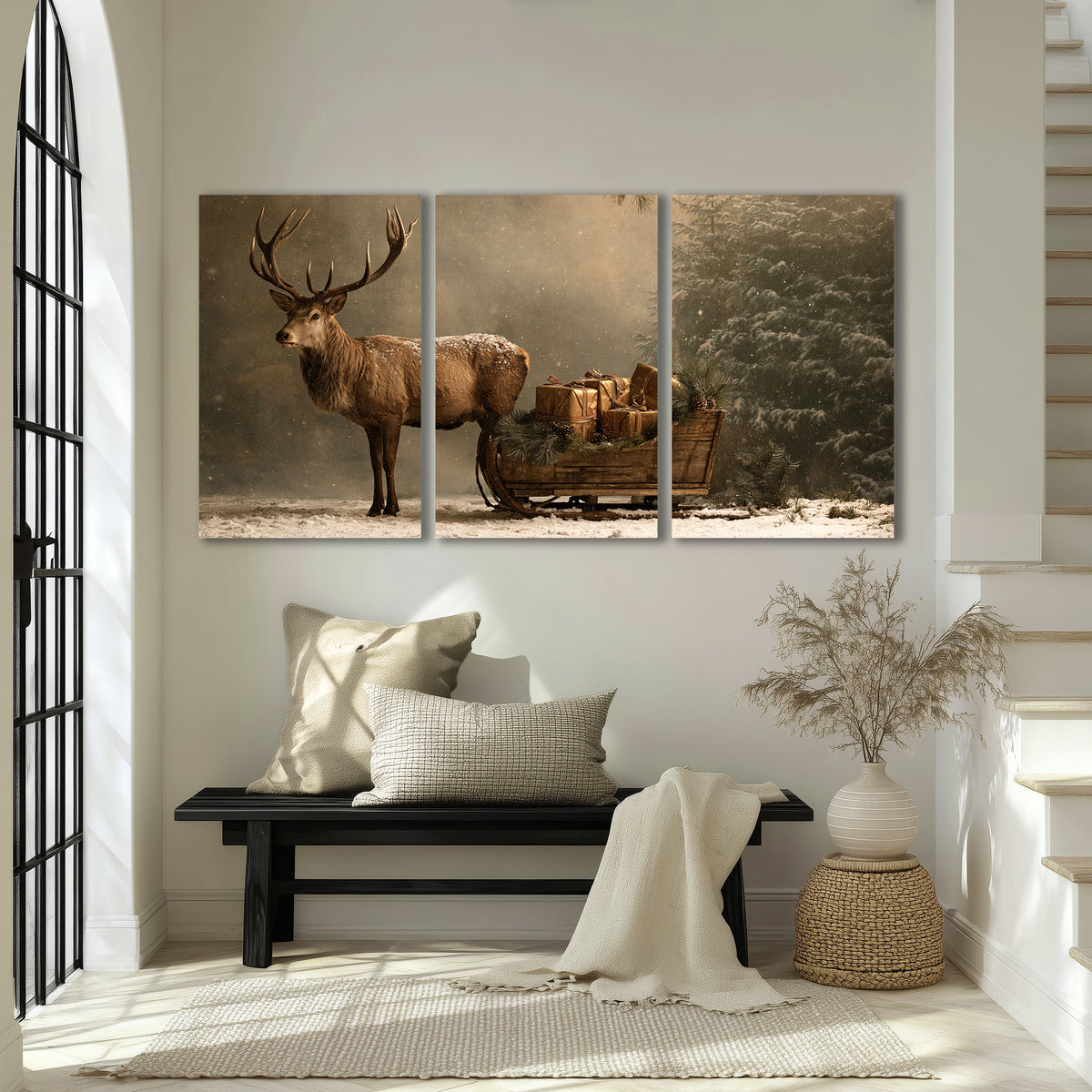 A stag beside a rustic gift-filled sleigh in a misty evergreen woodland 3 piece canvas wall art displayed in a entryway