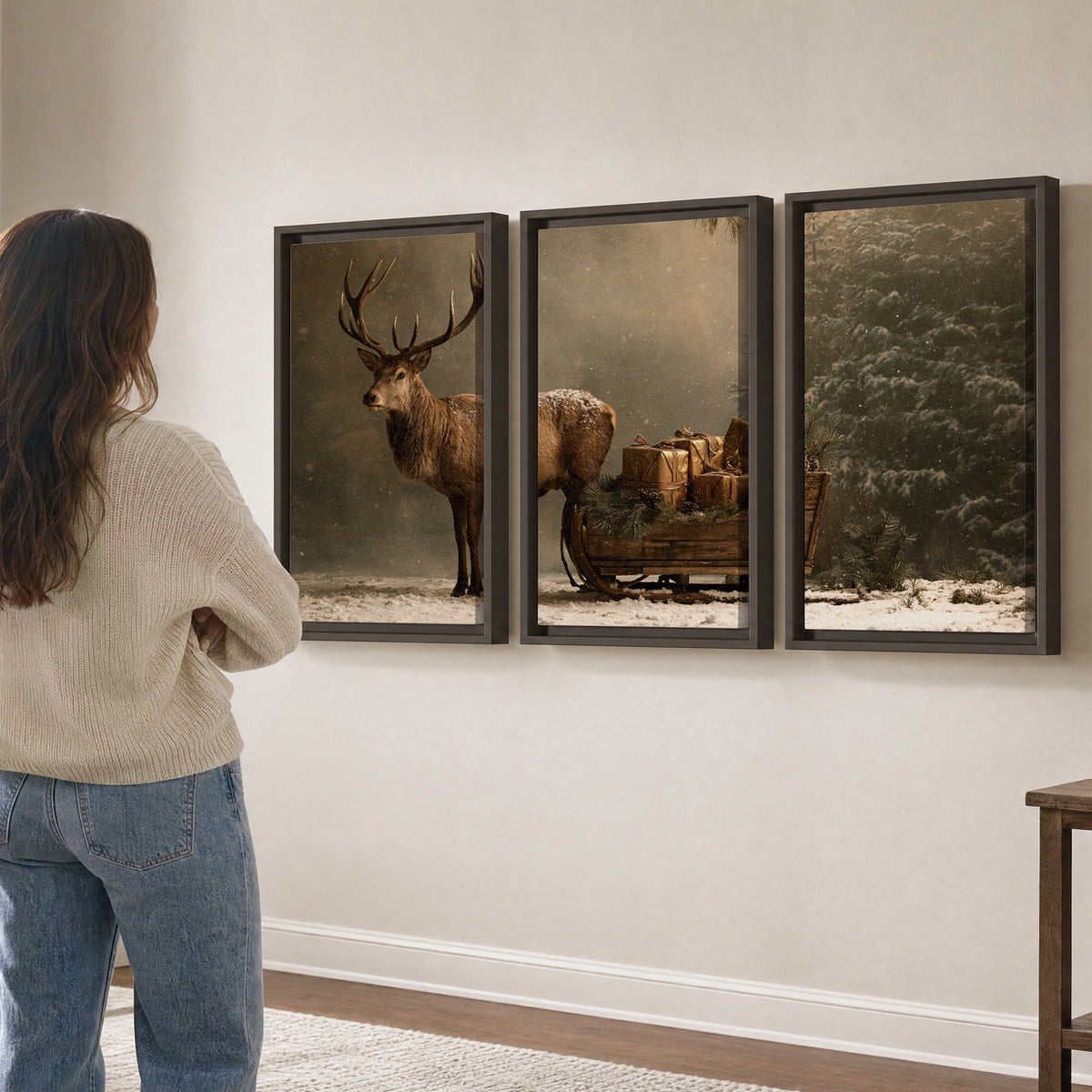 A stag beside a rustic gift-filled sleigh in a misty evergreen woodland 3 piece framed canvas wall art three panel arrangement on a wall
