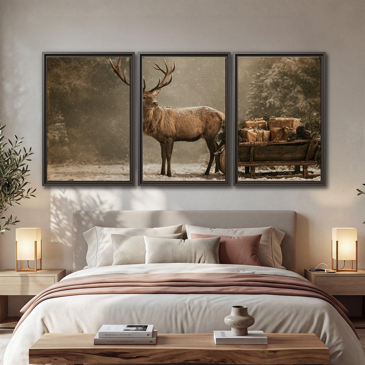A majestic stag beside a wooden sleigh filled with wrapped gifts in a softly lit woodland 3 piece framed canvas wall art displayed in a bedroom