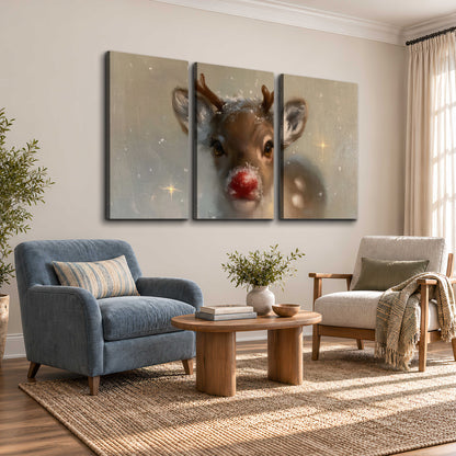 A young reindeer with a bright red nose surrounded by soft snowflakes and tiny painted stars 3 piece canvas wall art styled in an interior