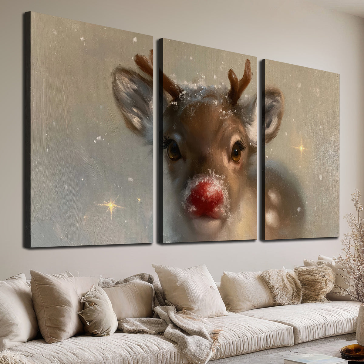 A young reindeer with a bright red nose surrounded by soft snowflakes and tiny painted stars 3 piece canvas wall art room and product view