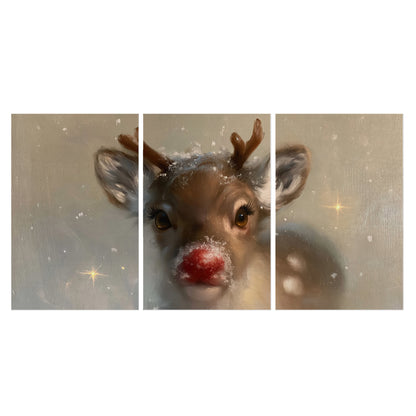 A young reindeer with a bright red nose surrounded by soft snowflakes and tiny painted stars set of 3 poster prints viewed straight on