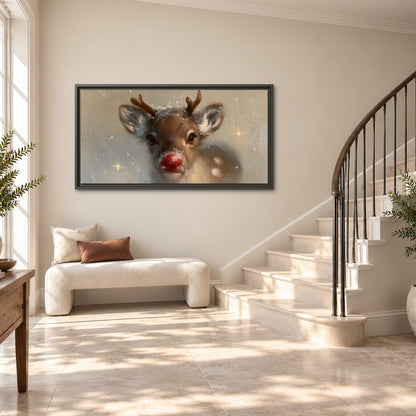 A young reindeer with a bright red nose surrounded by soft snowflakes and tiny painted stars single framed canvas wall art styled in an interior