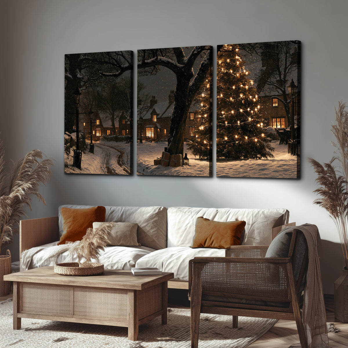 A tall illuminated Christmas tree beneath dark branches beside warmly lit snowy cottages 3 piece canvas wall art displayed in a rustic living room
