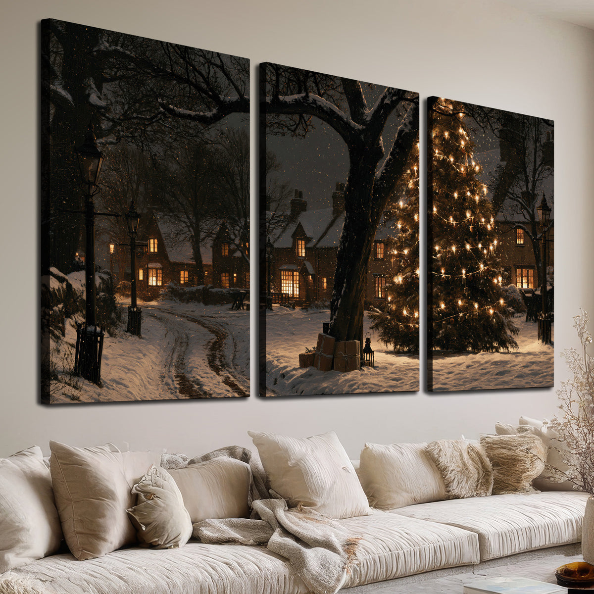A tall illuminated Christmas tree beneath dark branches beside warmly lit snowy cottages 3 piece canvas wall art room and product view