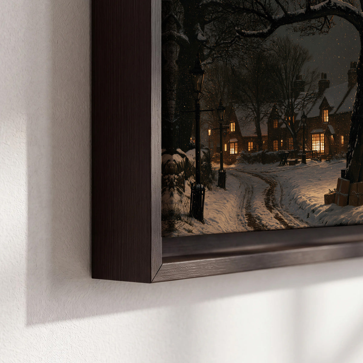 A tall illuminated Christmas tree beneath dark branches beside warmly lit snowy cottages 3 piece framed canvas wall art material and edge close up