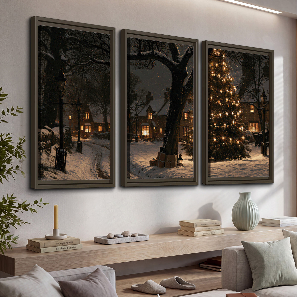 A tall illuminated Christmas tree beneath dark branches beside warmly lit snowy cottages 3 piece framed canvas wall art displayed in a console