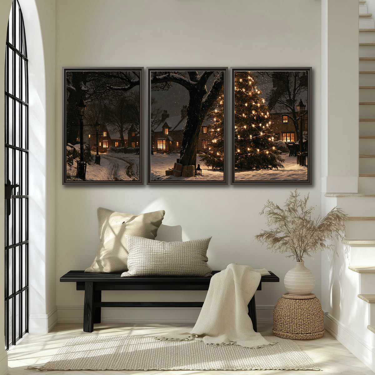 A tall illuminated Christmas tree beneath dark branches beside warmly lit snowy cottages 3 piece framed canvas wall art displayed in a entryway