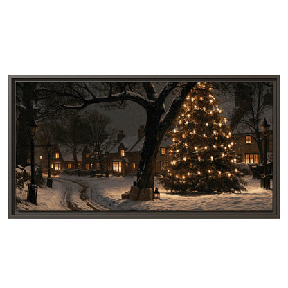 A tall illuminated Christmas tree beneath dark branches beside warmly lit snowy cottages single framed canvas wall art viewed straight on