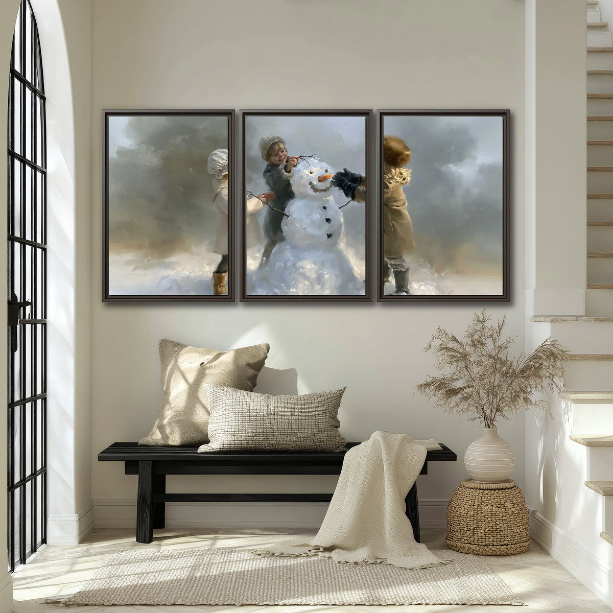 Three children gathering around a cheerful snowman on a quiet snowy winter day 3 piece framed canvas wall art displayed in a entryway