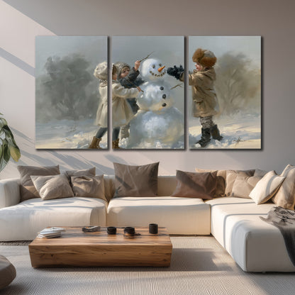 Two children putting the finishing touches on a snowman in a soft snowy landscape 3 piece canvas wall art displayed in a living room