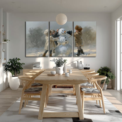 Two children putting the finishing touches on a snowman in a soft snowy landscape 3 piece canvas wall art room and product view