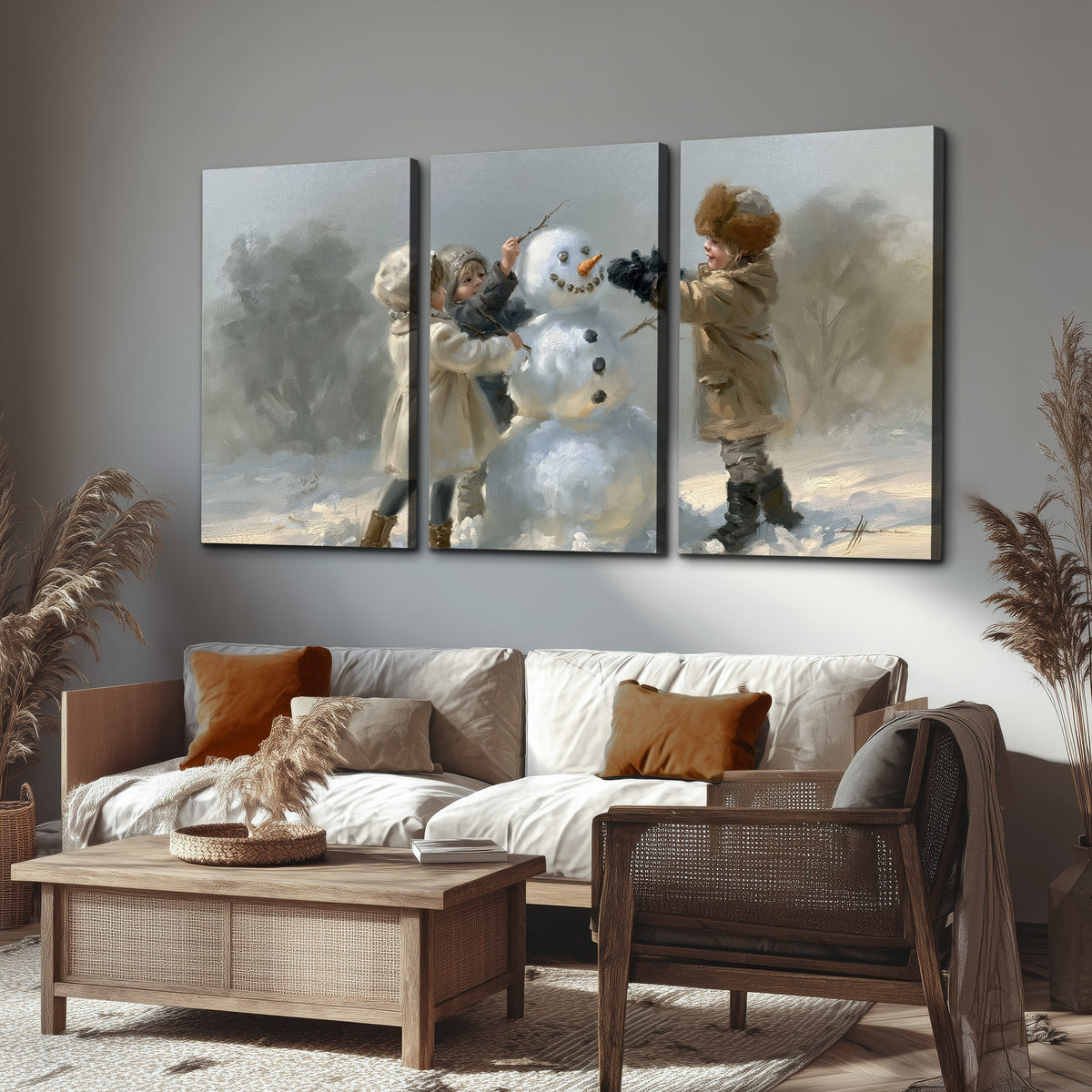 Two children putting the finishing touches on a snowman in a soft snowy landscape 3 piece canvas wall art displayed in a rustic living room