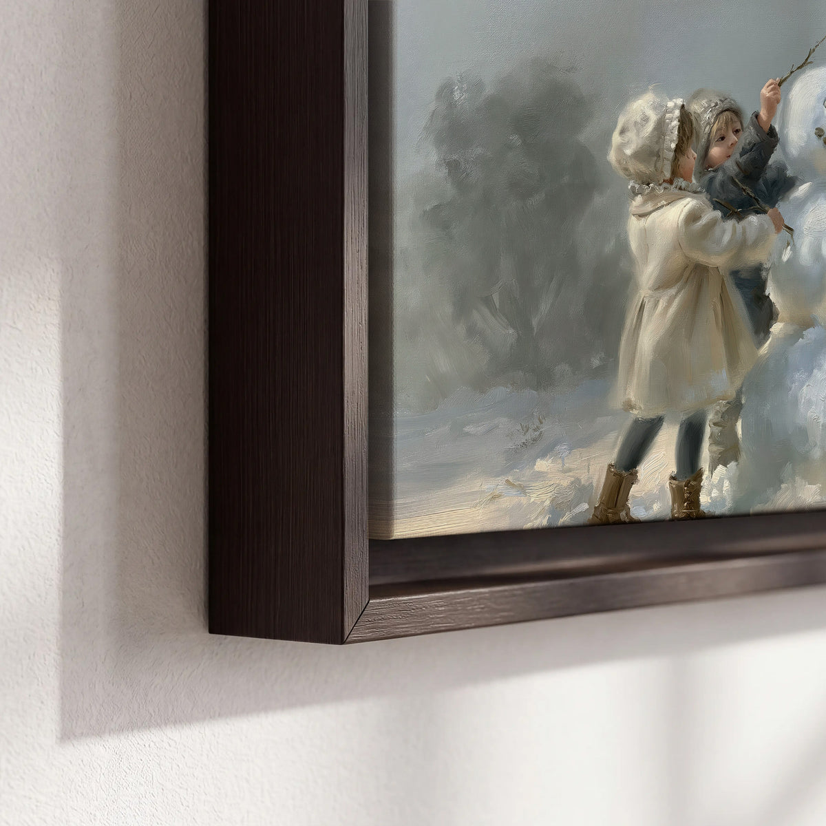 Two children putting the finishing touches on a snowman in a soft snowy landscape 3 piece framed canvas wall art material and edge close up