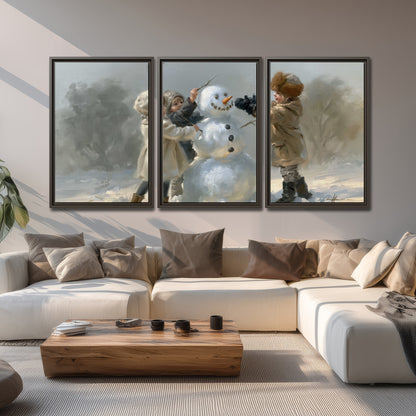 Two children putting the finishing touches on a snowman in a soft snowy landscape 3 piece framed canvas wall art displayed in a living room
