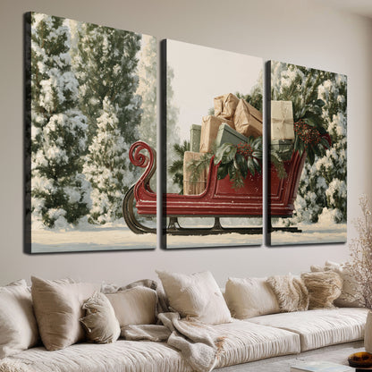 A red sleigh filled with wrapped gifts and evergreen branches among snowy fir trees 3 piece canvas wall art room and product view
