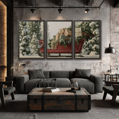 A red sleigh filled with wrapped gifts and evergreen branches among snowy fir trees 3 piece framed canvas wall art displayed in a industrial room